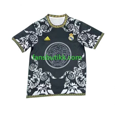 Fotballdrakt Real Madrid Versace Edition Hjemmetrøye Svart 2024-2025 Kortermet
